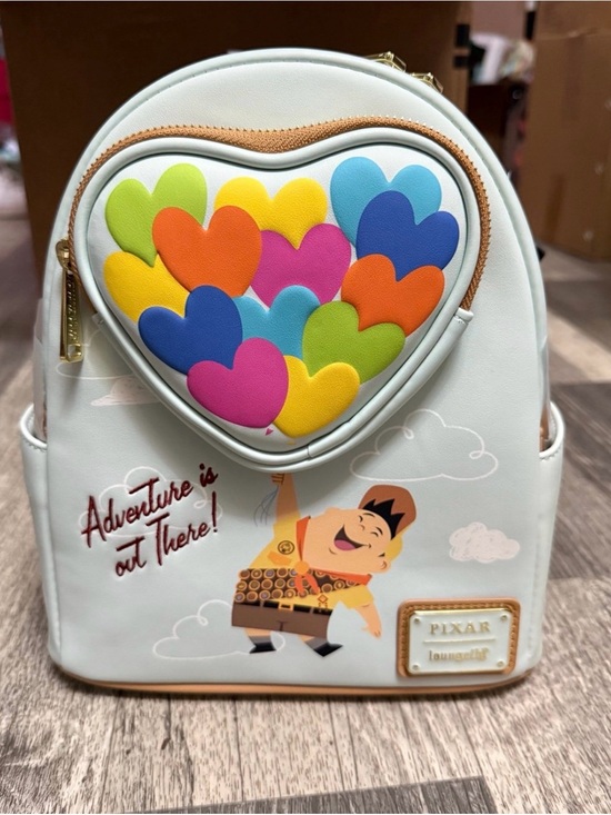 Loungefly Handbags - NWT LOUNGEFLY PIXAR Up Backpack with Russell Colorful Heart Balloons.